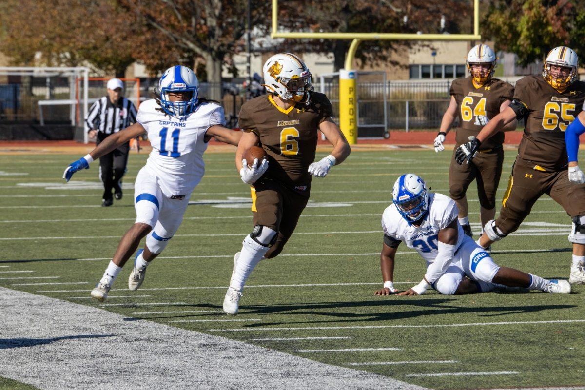 James Fara rushes for a gain. Fara recorded 68 yards in Saturday's game against Ursinus. - Saturday, Nov. 6, 2021. - Photo via Lee Kotzen 