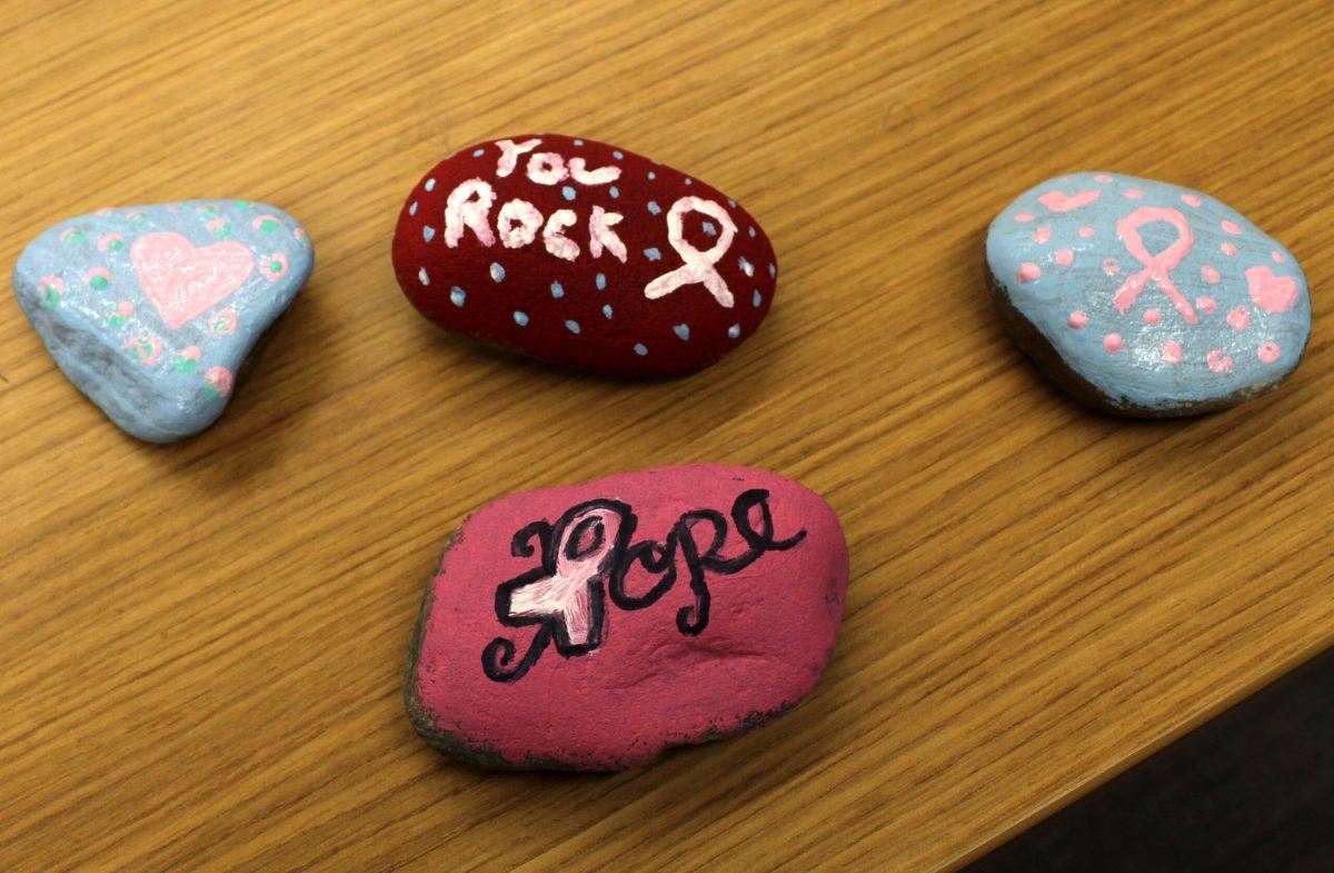 Rocks in all shapes, sizes, and colors were painted to show support for breast cancer awareness. - Opinion Editor / Sylent Michaels 