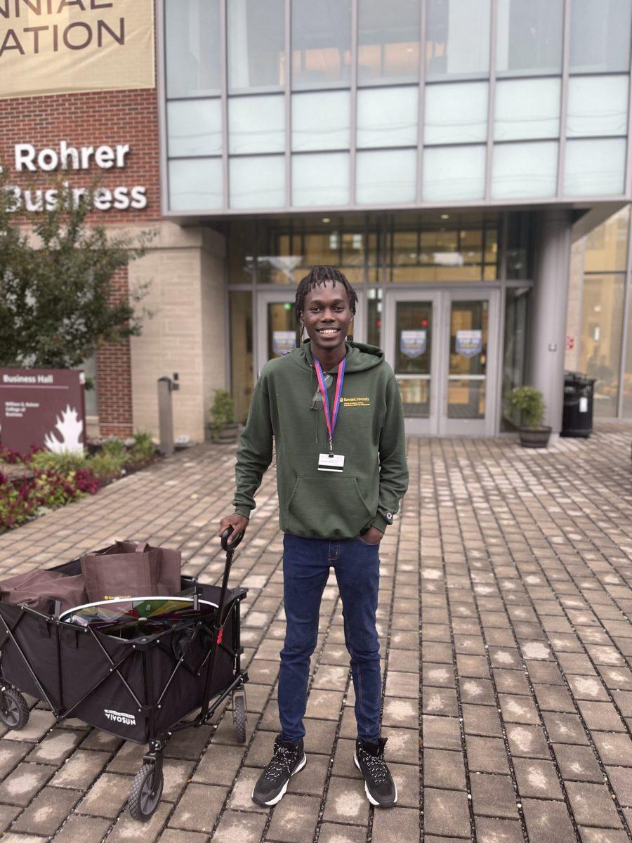 Erwin Wambi poses for a photo outside of Business Hall. - Photo via Erwin Wambi