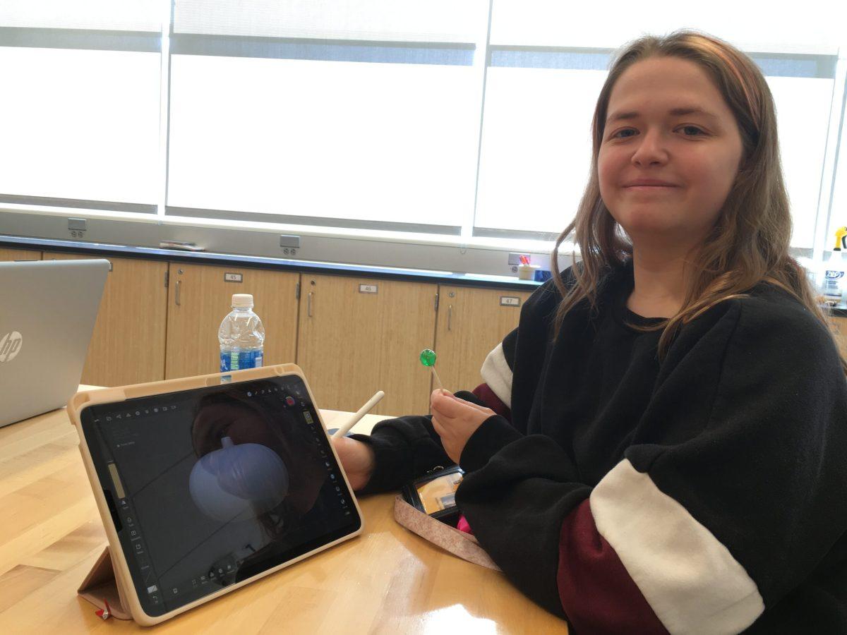 Mackenzie Kaiser, a physics major, shows her in process submission for 3D Halloween Printing competition. — Abigail Twiford / Managing Editor