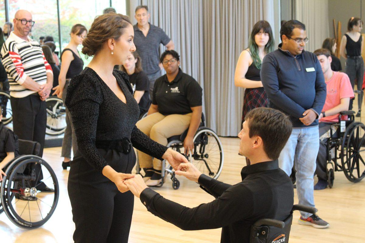 Artistic Director Aubree Marchione dances with gymnast Rik Daniels as an instructor for the ballroom dancing class. — Staff Writer / Joshua Ayers 