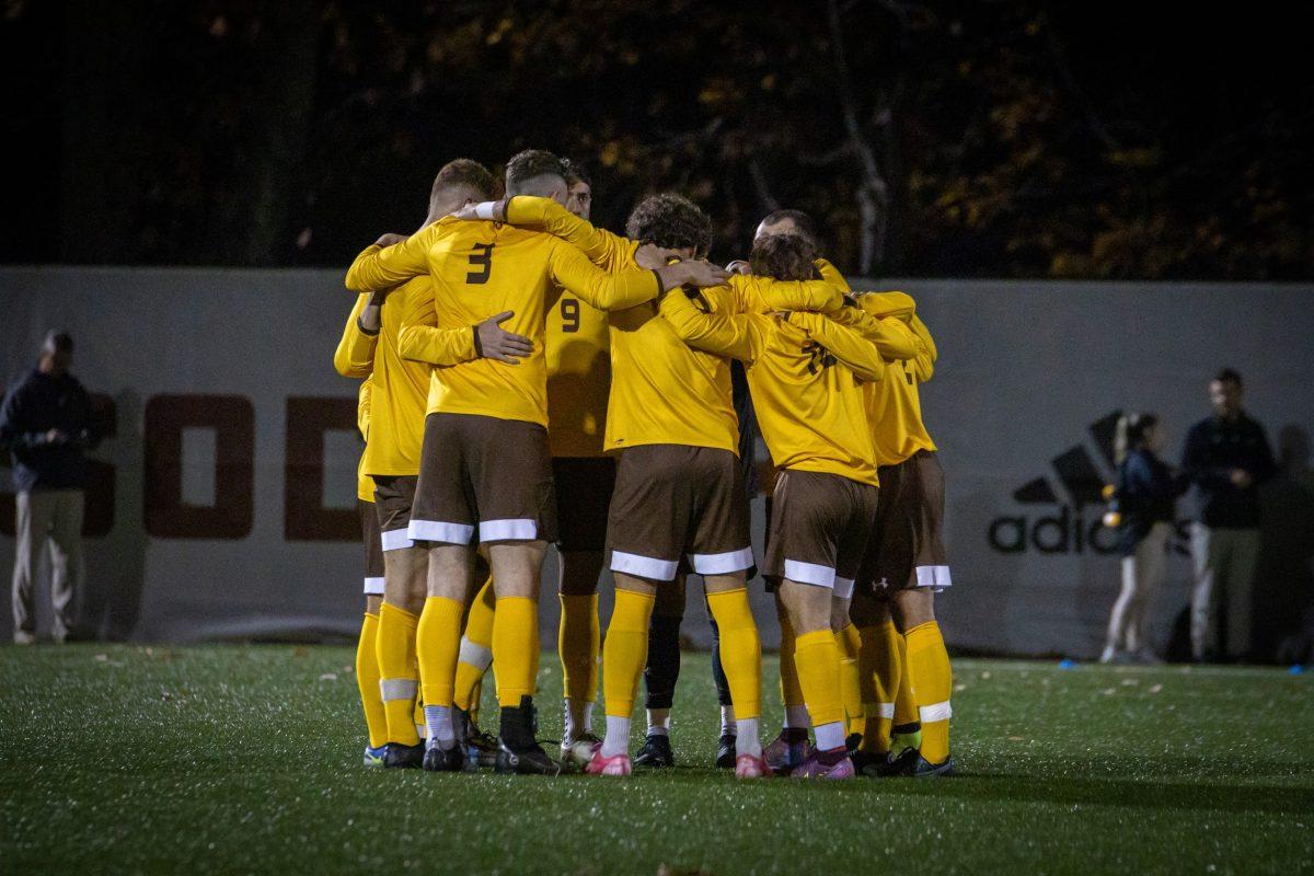 The team huddles before a match. Rowan went 6-2-1 in conference games this season. - Friday, Nov. 4, 2022. - Photo via Lee Kotzen