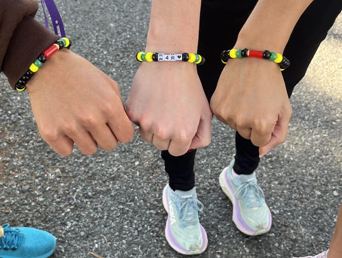 The Rowan Women's Cross-Country team's "Run for Ringo" bracelets in honor of their former Head Coach Derek "Ringo" Adamson. - Photo via Adam Krutman