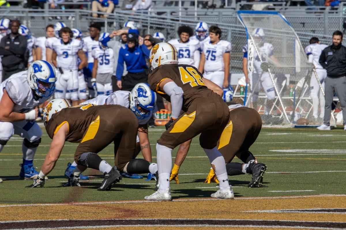 Vincent Guarino lines up on defense. Guarino recorded 11 tackles and a forced fumble on Saturday. - Saturday, Nov. 6, 2021. - Photo via Lee Kotzen