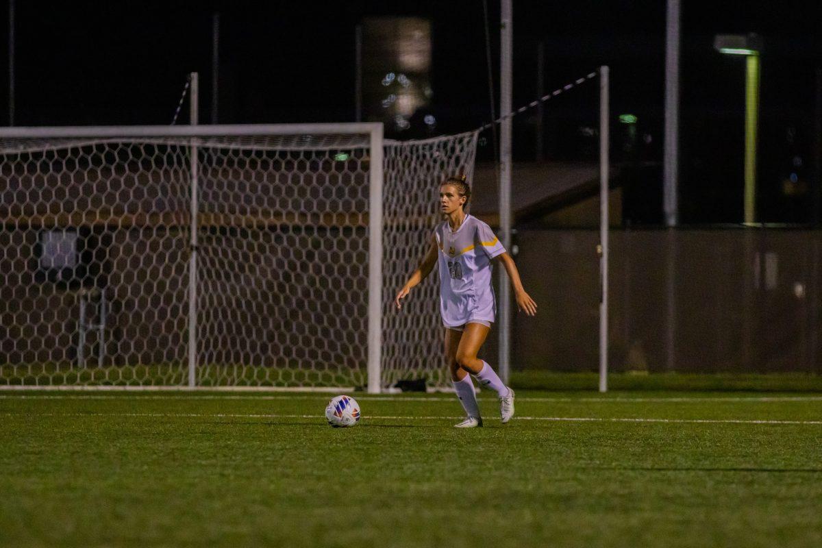 Emma DeMaise looks to pass the ball. DeMaise is the team's captain this season. Wednesday, Sept. 13, 2023. - Photo via Lee Kotzen