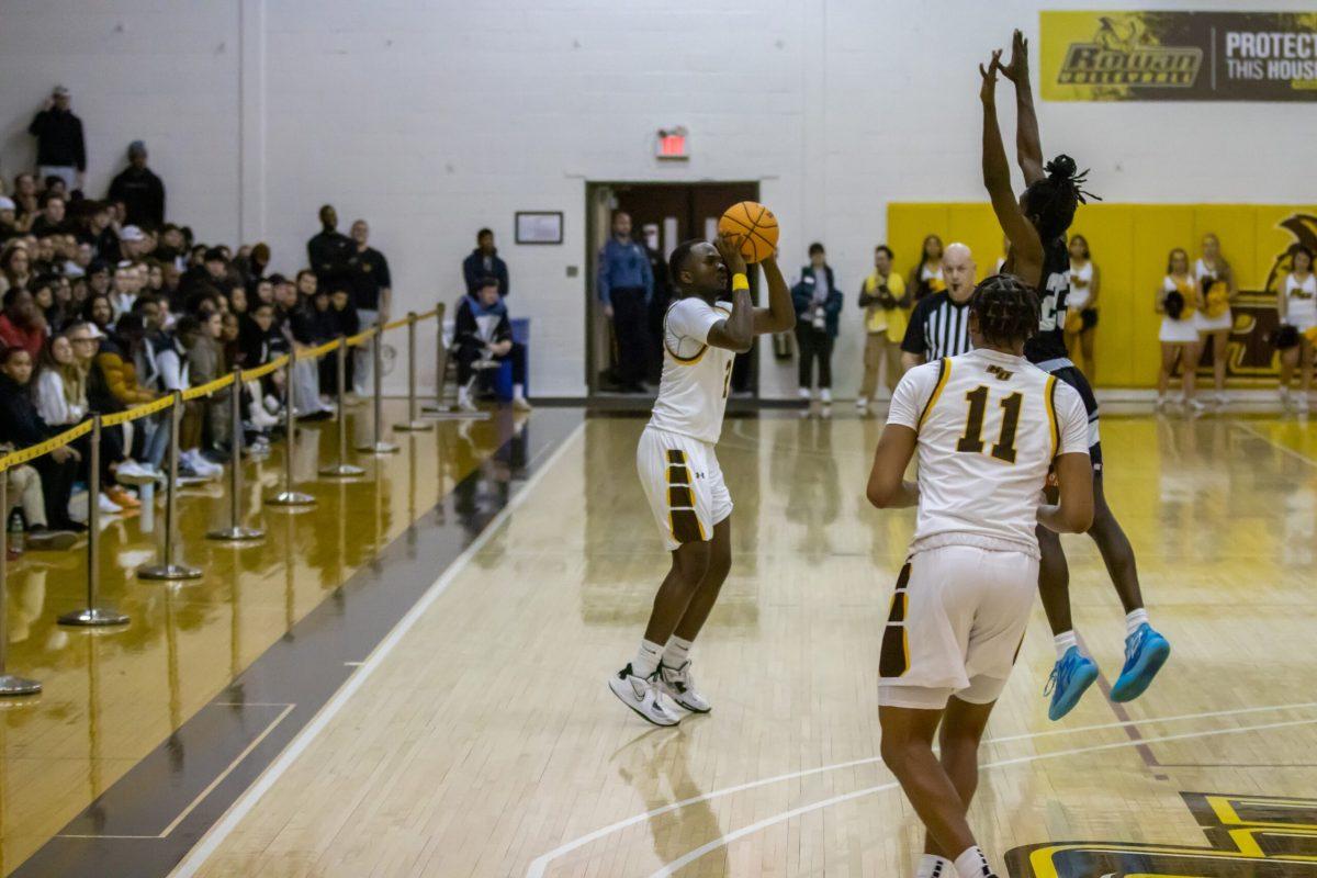 Marcellus Ross rises for a three. Ross led the team in scoring with 25 points. - Friday, Feb. 24, 2023. - Photo via Lee Kotzen