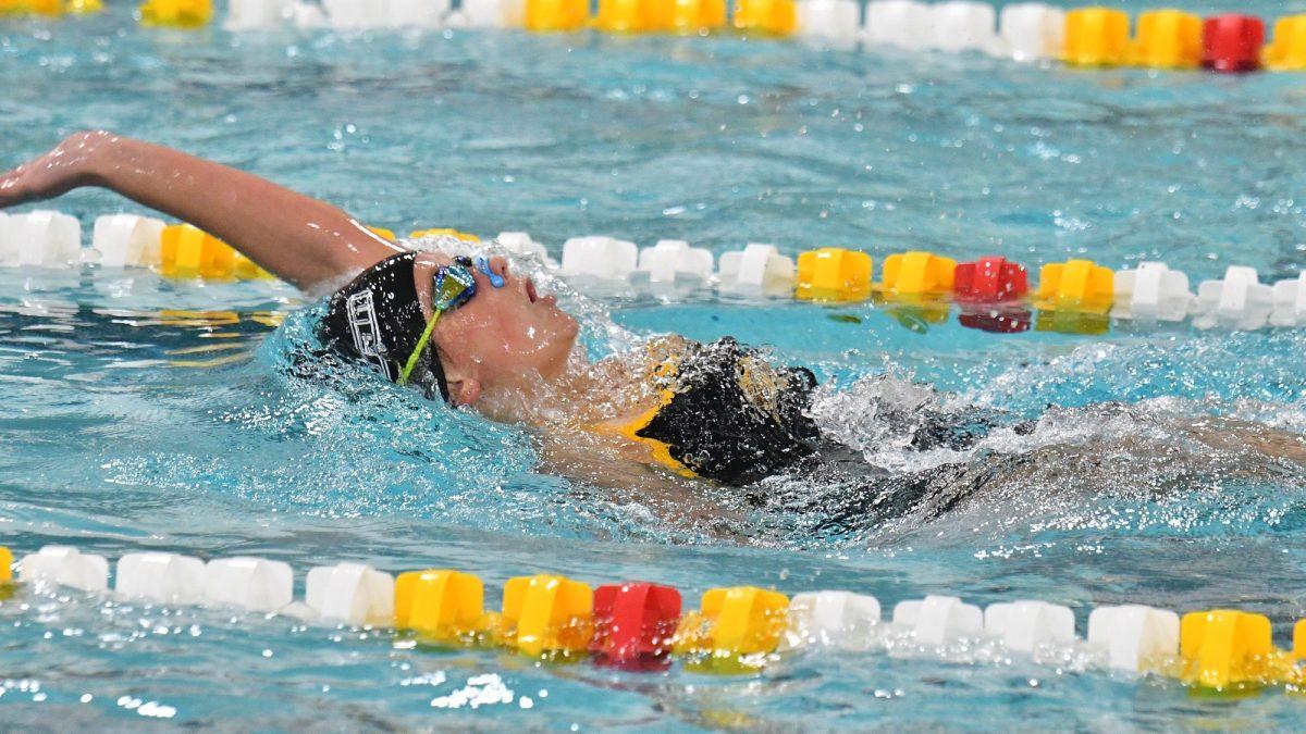 Ella Pennington competing in a race. - Photo via Rowan Athletics