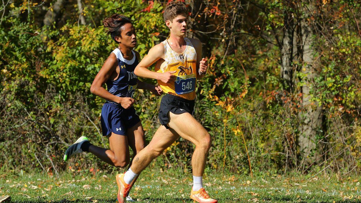 Jacob Riley races to the finish line. Riley is one of seven Profs to earn All-Conference honors this season. - Photo via Rowan Athletics