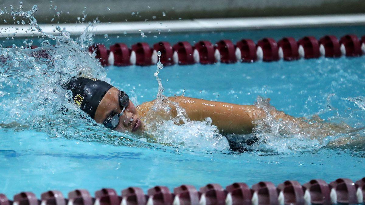 Trisha Lau competes in a race. Lau recorded a first-place finish in the 200-yard free and 400-yard free. - Photo via Rowan Athletics