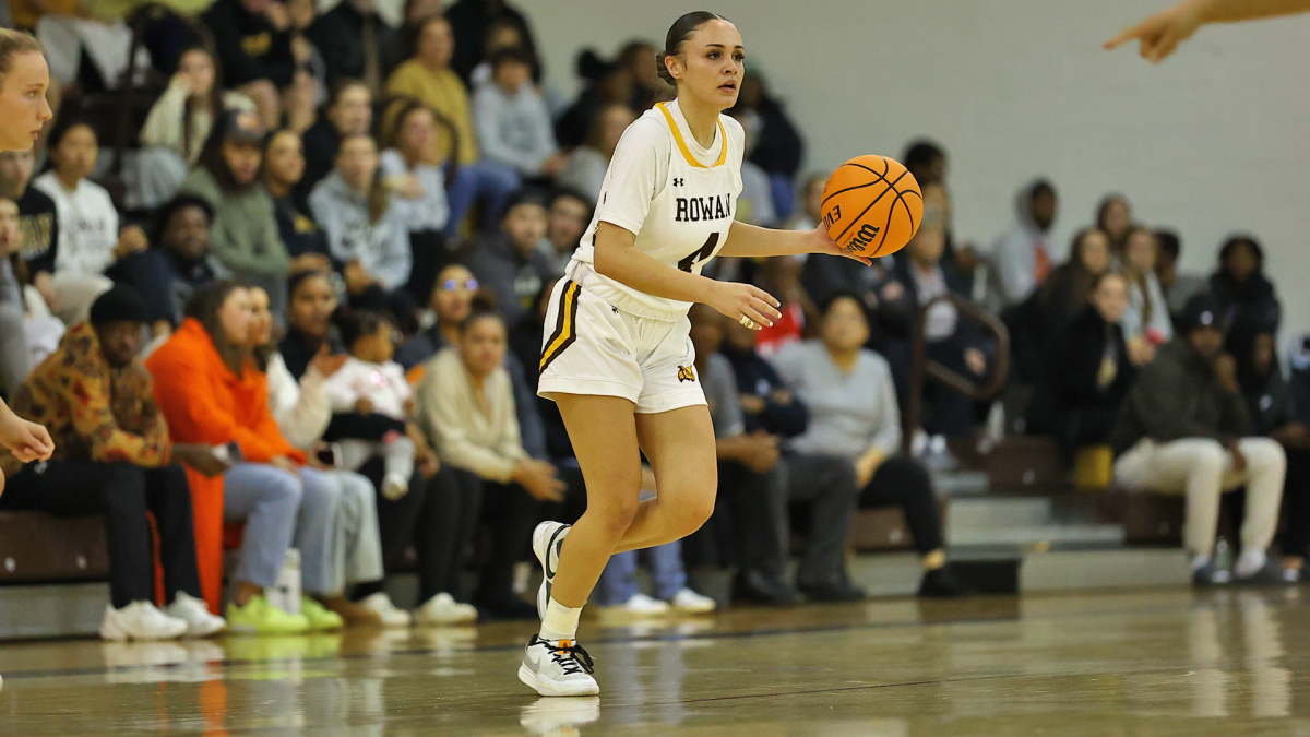 Sabrina Araujo dribbles the ball up the floor. Araujo recorded 13 of the team's 46 bench points. - Photo via Rowan Athletics