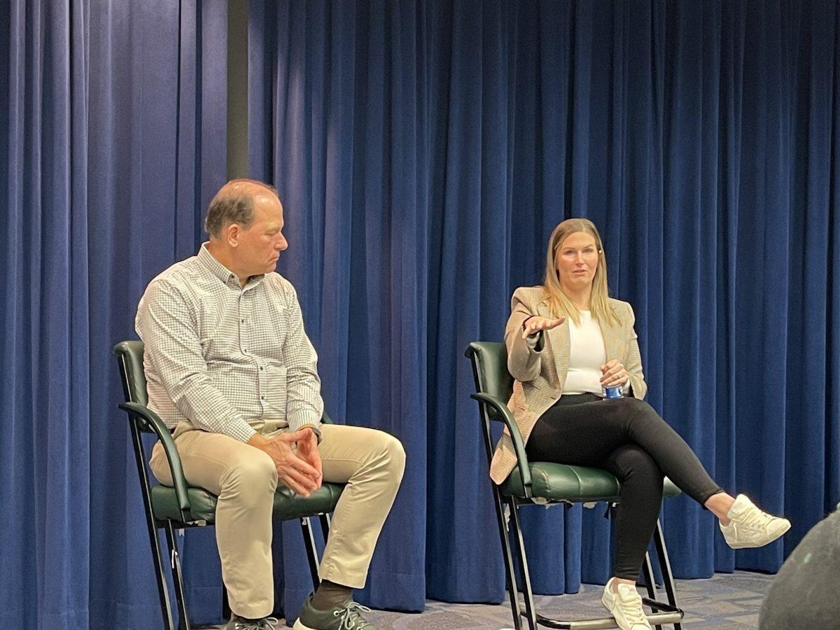 Ashley Dabb and Niel Hartman speaking to students. - Photo via @RowanSportsCAM on X