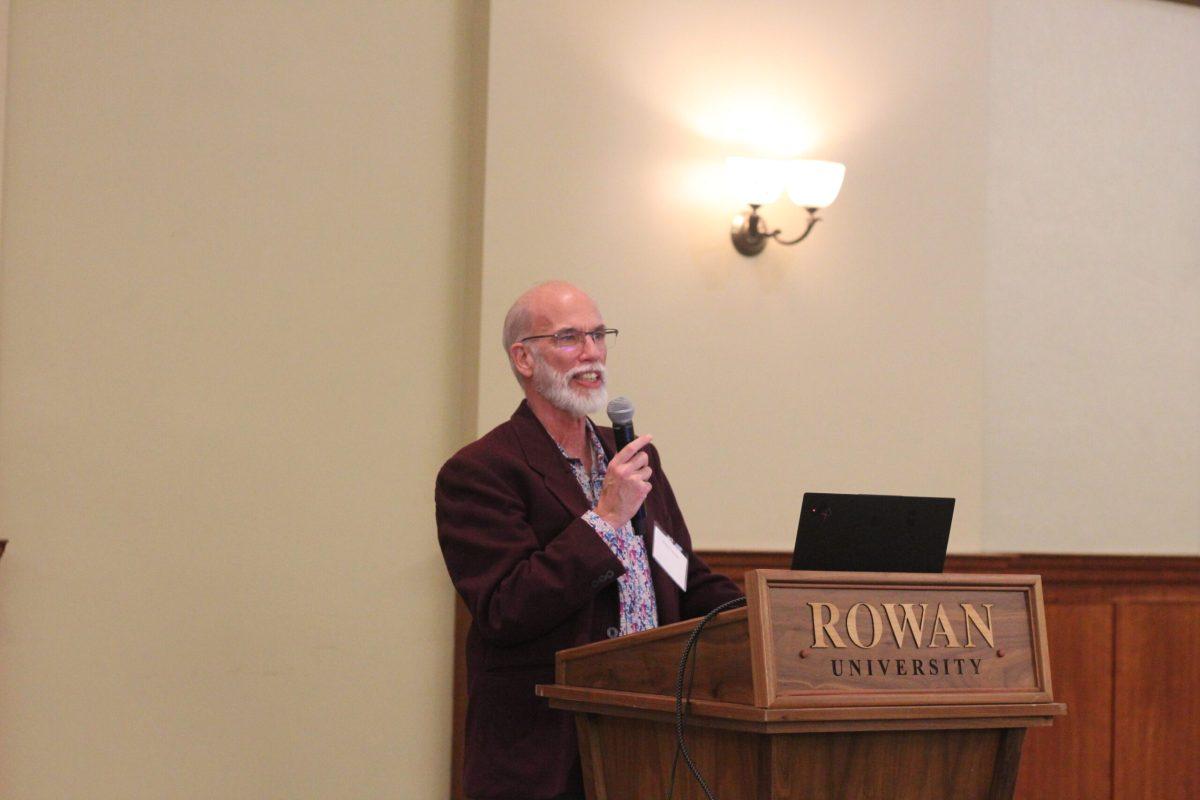 Dean of the Edelman College of Communication and Creative Arts Sanford Tweedie addresses the showcase attendees. - Photo via Ava Fricke