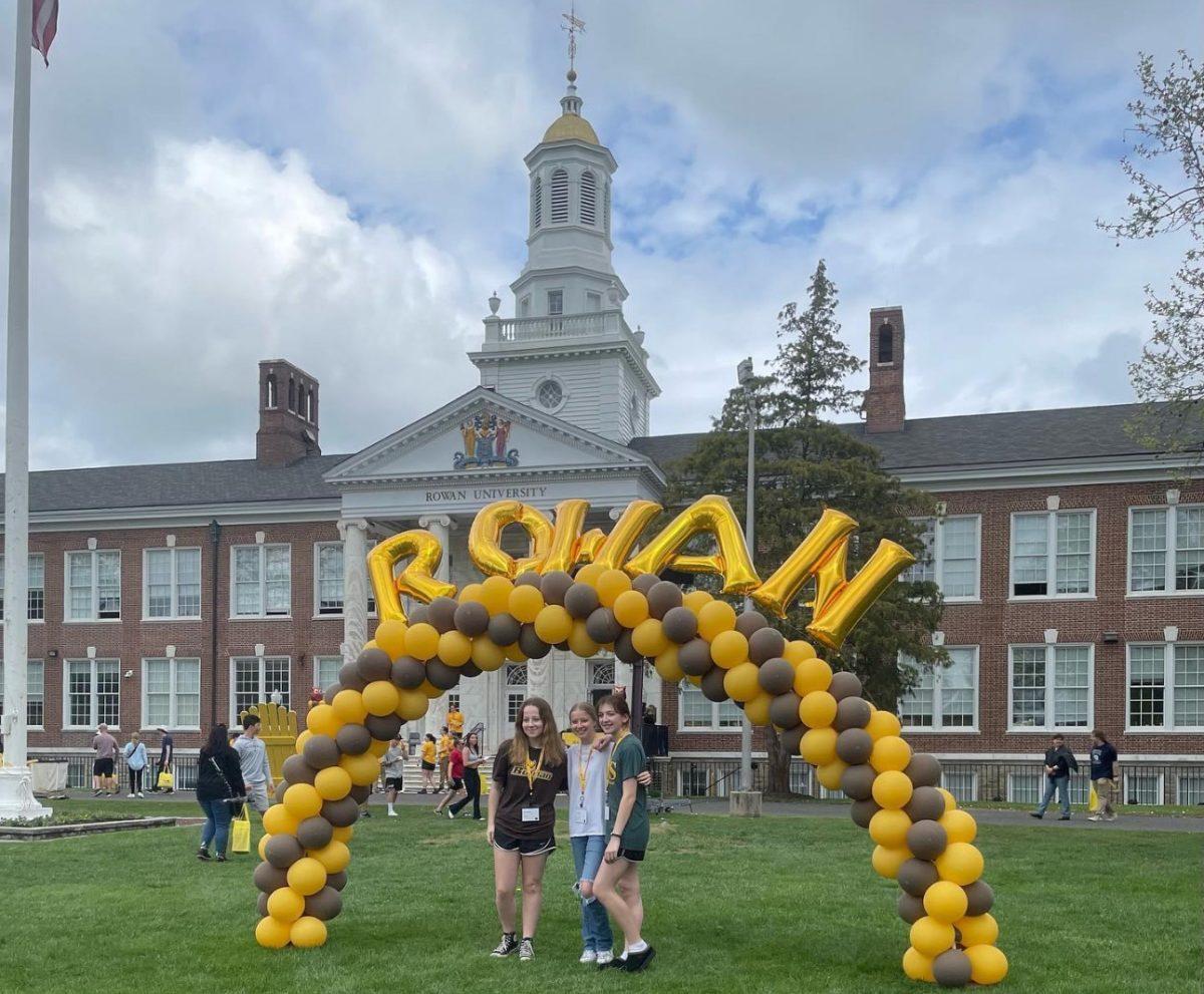 Shockey(left) and her high school friends Erin Doyle (middle) and Desiree Bauer(right) taking a photo in front of Bunce Hall at Accepted Students Day. - Photo via Sarah Shockey