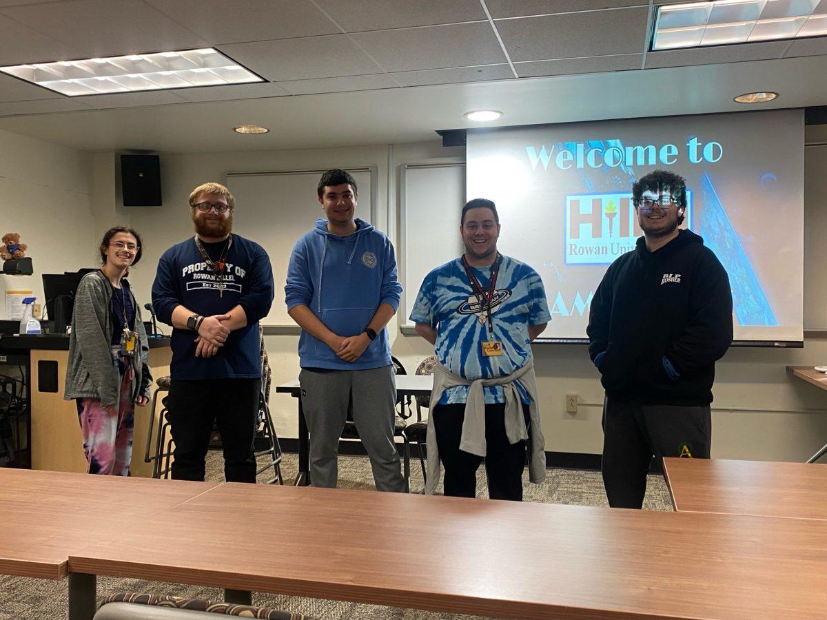 Hillel's e-board poses for a photo at their game night event. - Contributor / Erik Gil