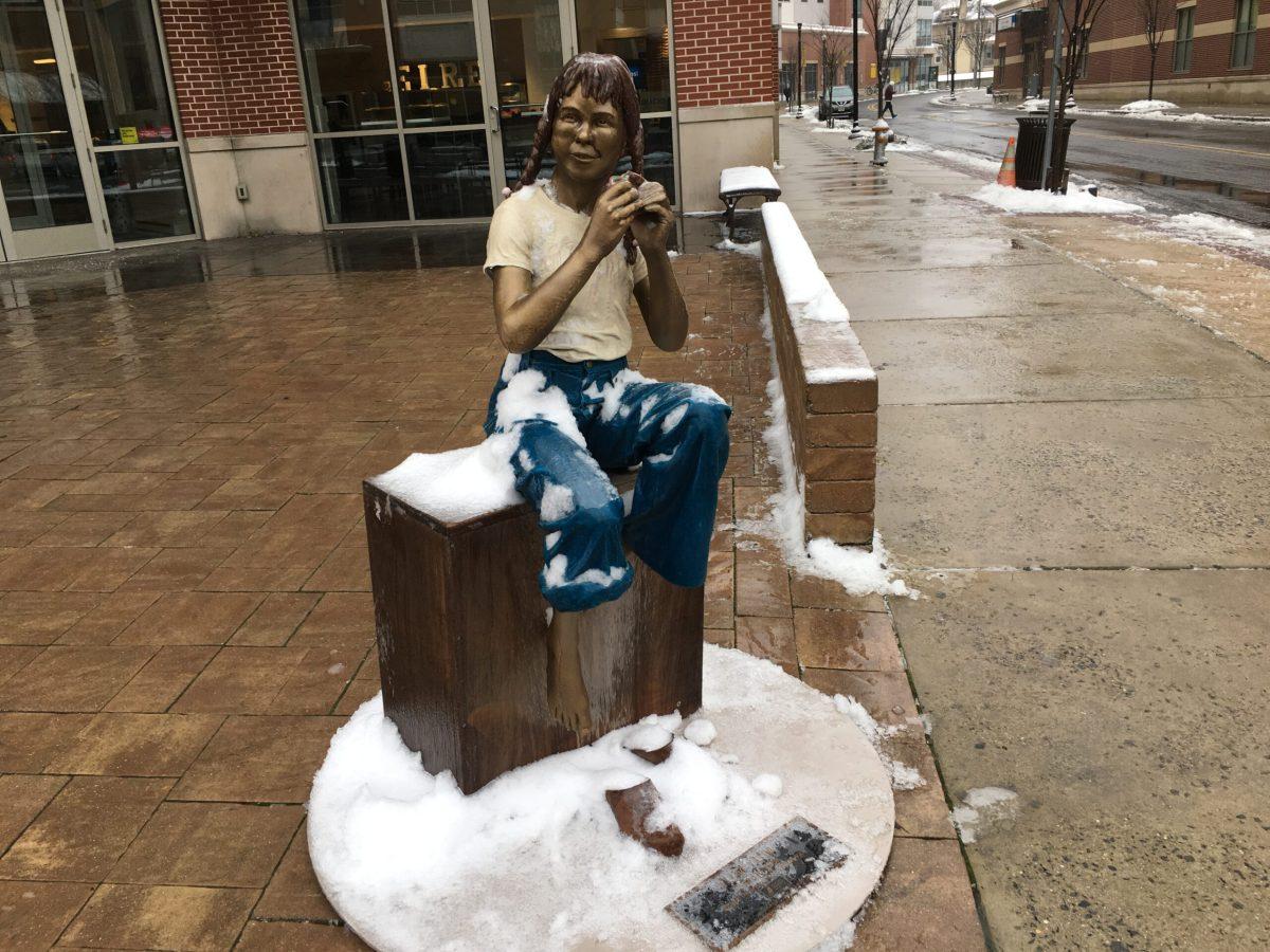 Statue on Rowan Boulevard is coated in snow after winter storm graces Rowan's campus. - Managing Editor / Abigail Twiford