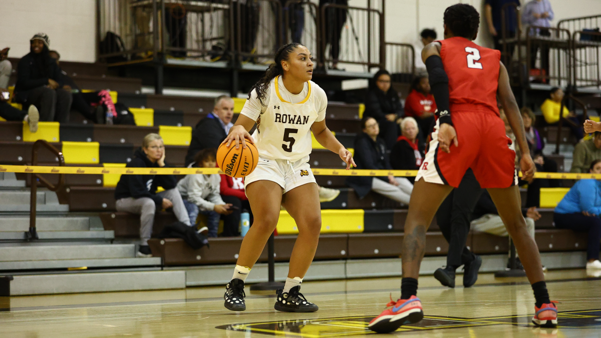 Nicole Mallard scans the defense. Mallard scored 13 points in the Profs' win over William Paterson. - Photo via Rowan Athletics