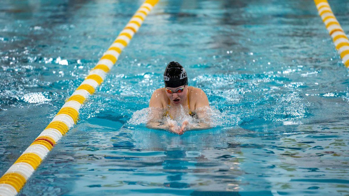 Bella Stefanowicz competes in a race. Stefanowicz set a personal-best in the 100 breast and 500 free. - Photo via Rowan Athletics