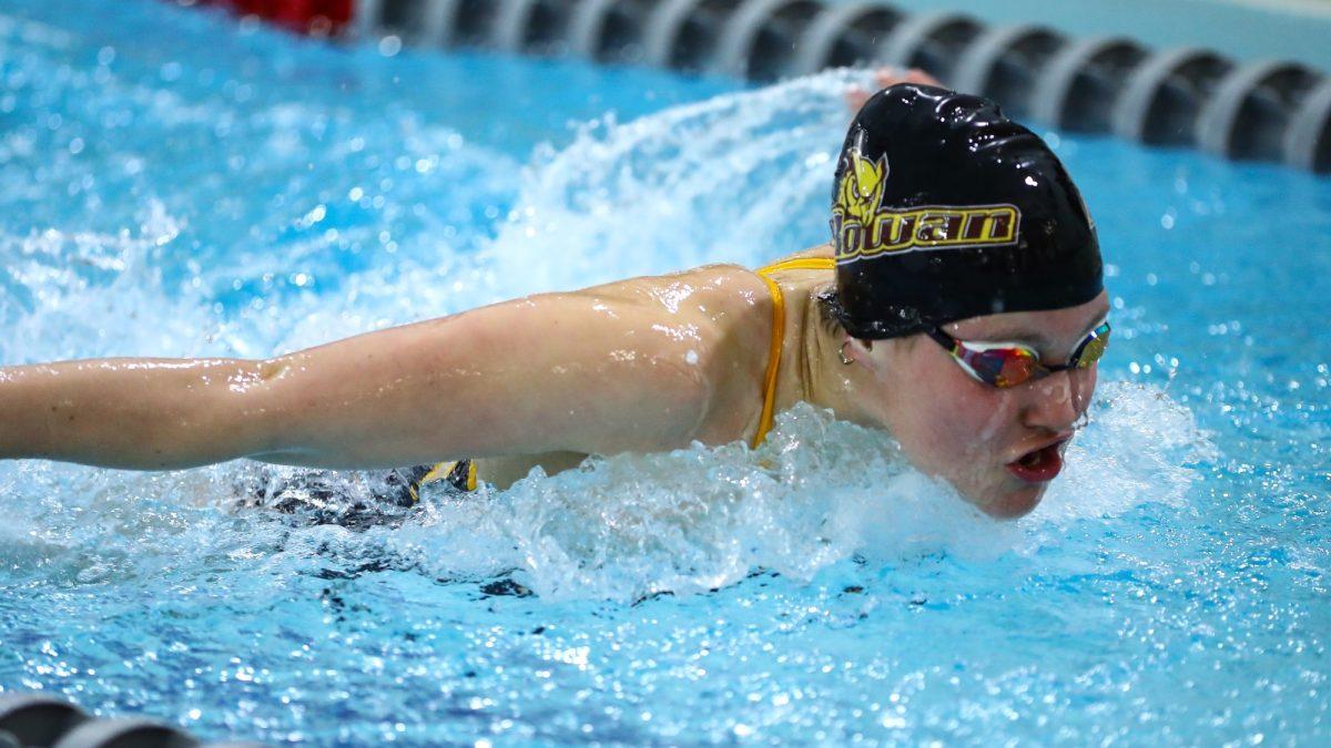 Bella Stefanowicz swims in a race. She is one of the leaders on the women's swim team. - Photo via Rowan Athletics