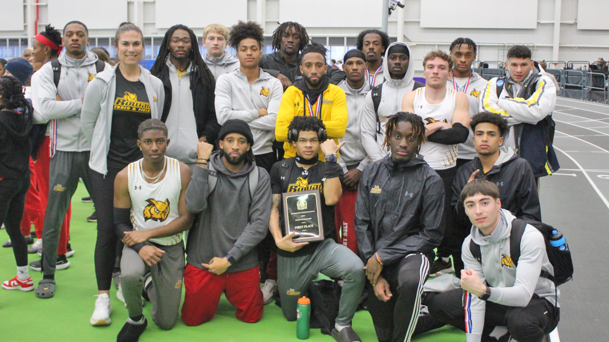 The team celebrates their team title at the Metropolitan Championships. Rowan put up 185 points to beat out Fordham for first. - Photo via Rowan Athletics