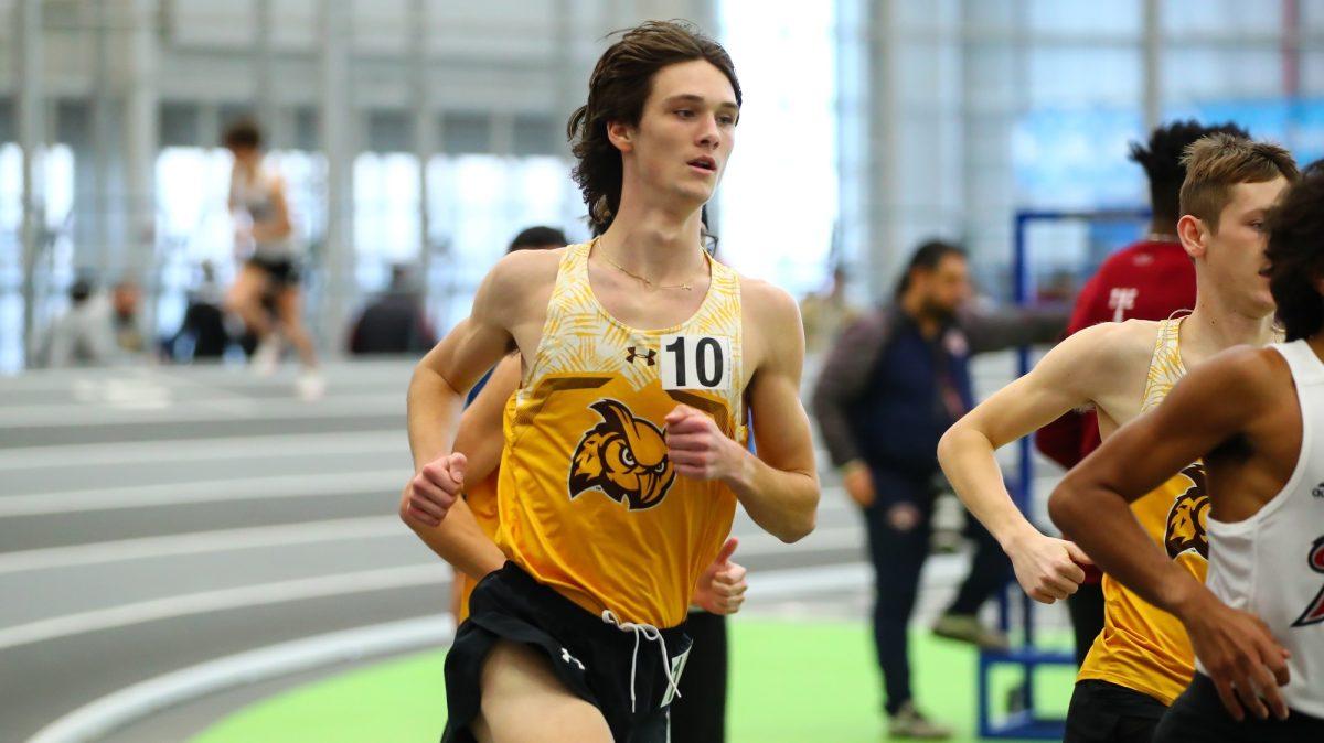 Scott Hubbard runs in a race. Hubbard broke the 27-year-old record in the mile on Friday, Feb. 23. - Photo via Rowan Athletics