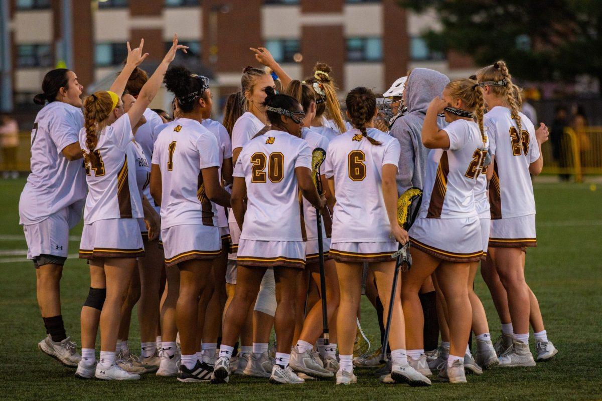 The women's lacrosse team huddles up. Rowan was ranked second in the conference in the preseason rankings. - Wednesday, April 19, 2023. - Photo via Lee Kotzen