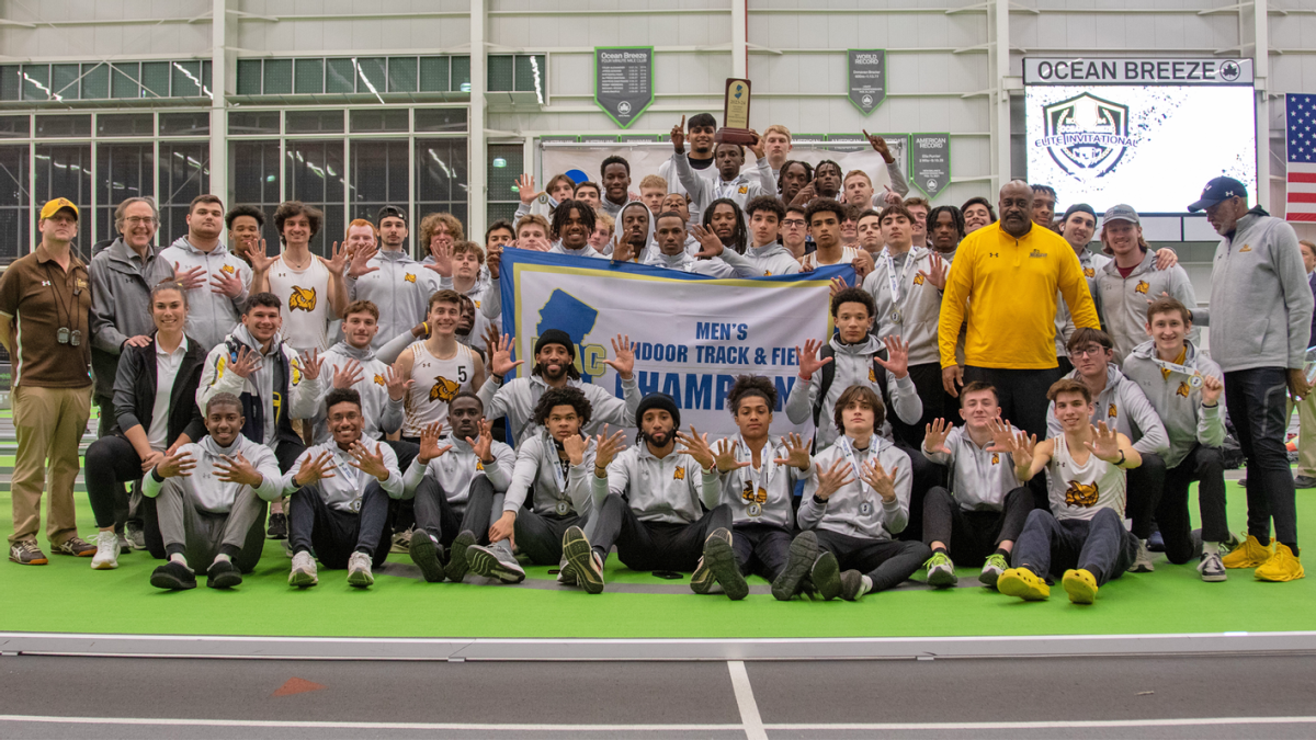 Rowan men's indoor track and field poses after their ninth consecutive NJAC Championship victory. - Photo via Rowan Athletics