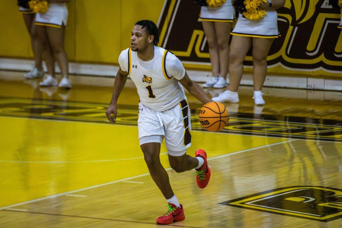 Ja'Zere Noel brings the ball up the court. Noel recorded 15 points and 17 rebounds against TCNJ. - Saturday, Feb. 3, 2024. - Photo via Lee Kotzen