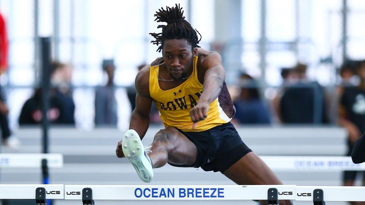 Jason Agyemang competing in the hurdle. Agyemang was an All-American during the indoor season and is looking to repeat in the spring. - Photo via Rowan Athletics