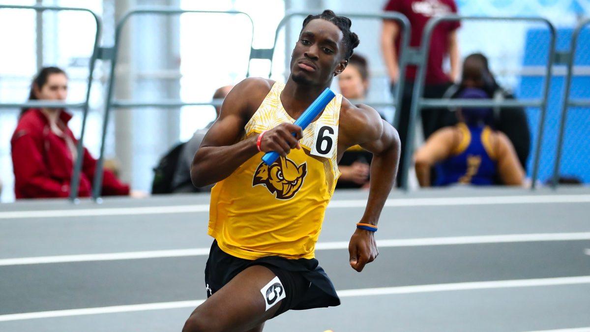 Kwaku Nkrumah runs in a race. Nkrumah recorded a first place finish in the 60 meter hurdle. - Photo via Rowan Athletics