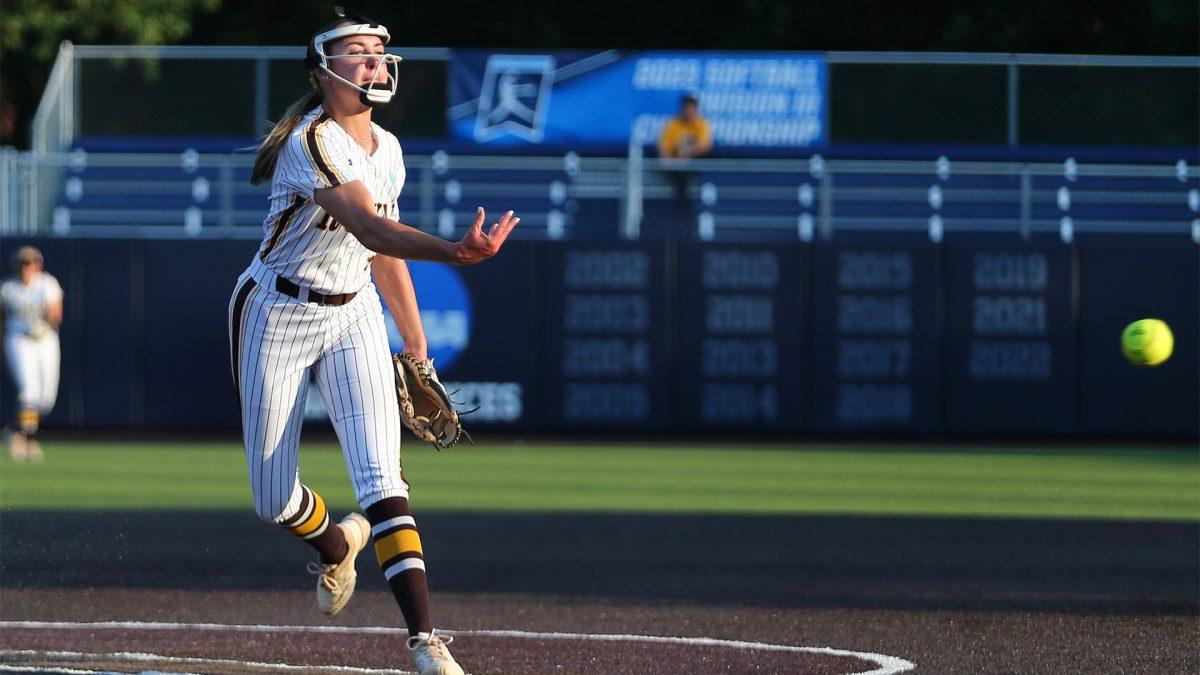 Rylee Lutz in her throwing motion. On Friday, March 22, Lutz threw Rowan softball's first no-hitter since 2019. - Photo via Rowan Athletics