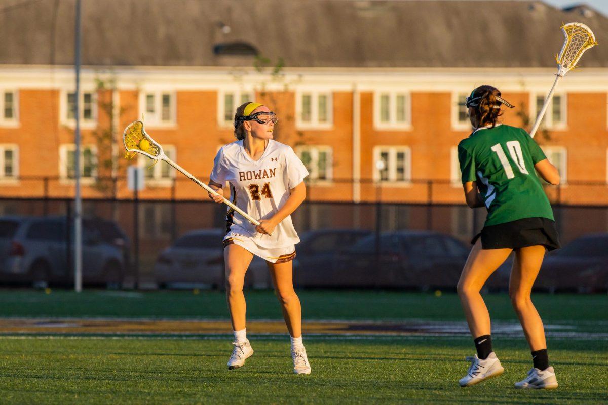 Molly Green attacks the defense. Green recorded two goals in the loss. - Wednesday, April 19, 2023. - Photo via Lee Kotzen