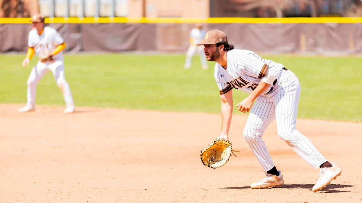 Pat Defeciani gets ready to field. Defeciani hit two home runs and drove in a team-high five runs in the 20-5 win. - Photo via Rowan Athletics