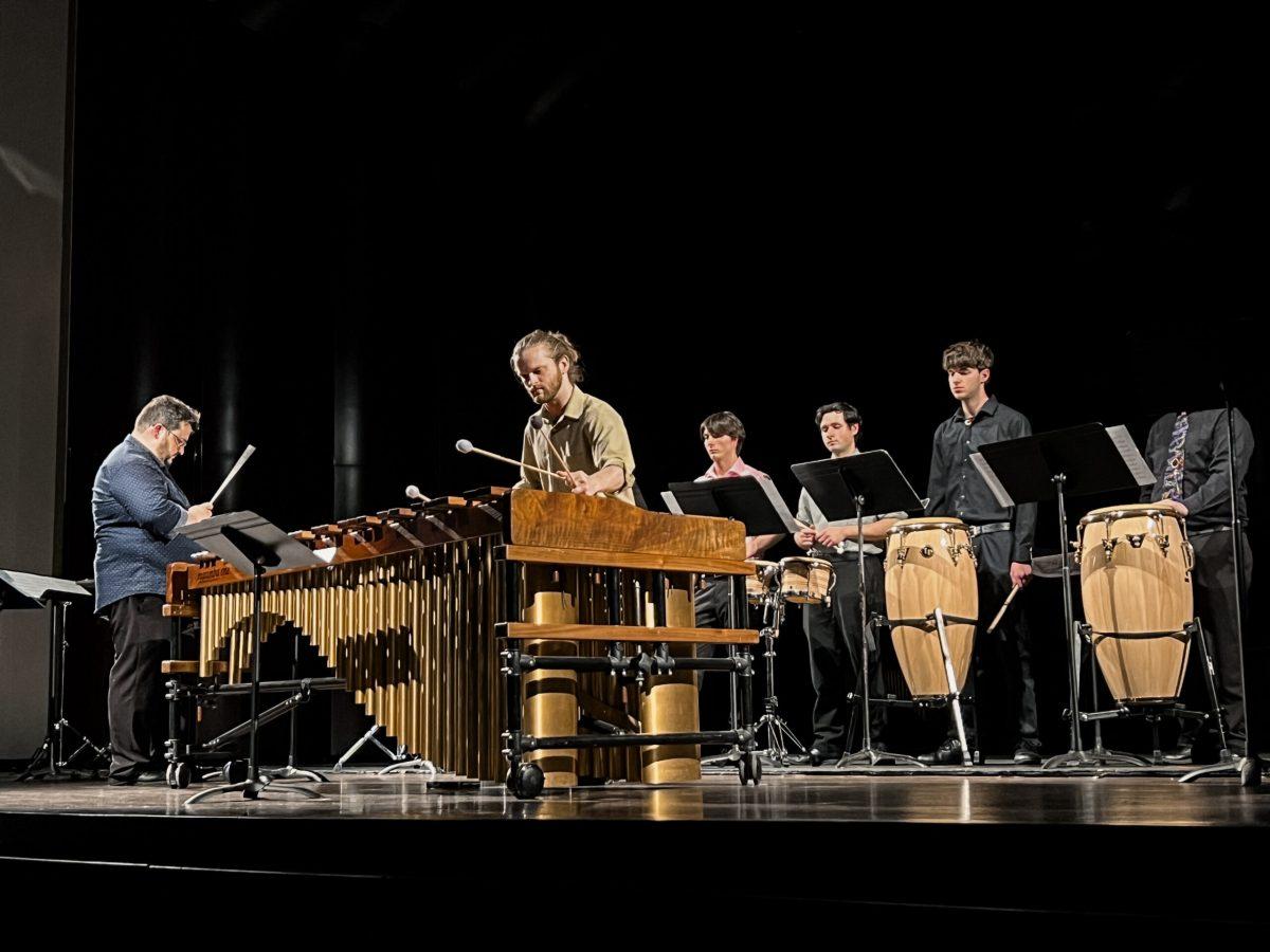 "The clashing and clanging of the cymbals made for an intense, thunder-like sound that rang through Pfleeger." - Staff Writer / Beth Cimaglia.