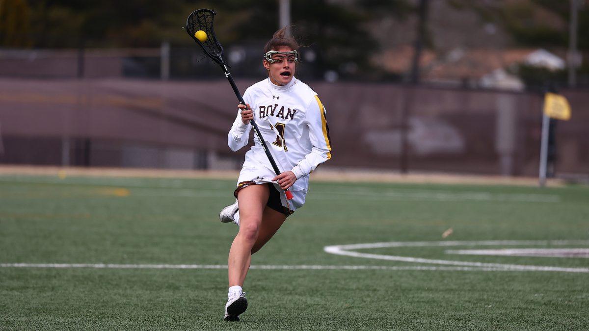 Sophia Schiavo attacks the defense. The captain has totaled five points and grabbed 55 ground balls so far this season. - Photo via Rowan Athletics