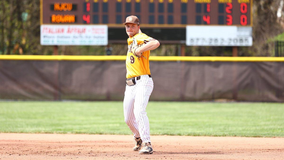 Tyler Cannon throws the ball to first. Cannon is one of the team's captains this year. - Photo via Rowan Athletics