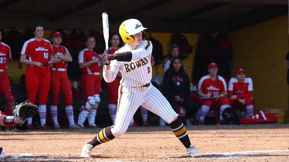 Kaitlyn Riggs loads up her swing. Riggs went 5-6 with 5 RBI across the two games. - Photo via Rowan Athletics