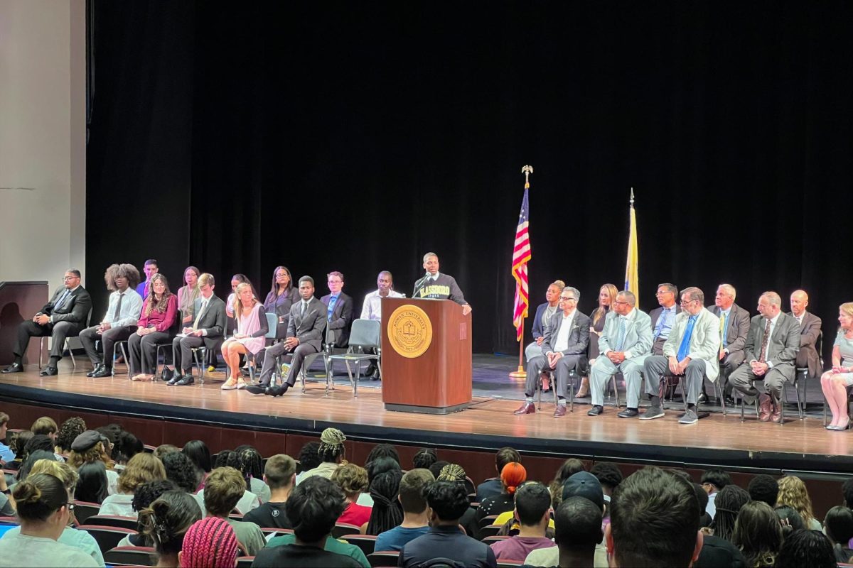 President Zackary Brown addresses the crowd at Pfleeger Concert Hall. - Photo via Genevieve Saquella
