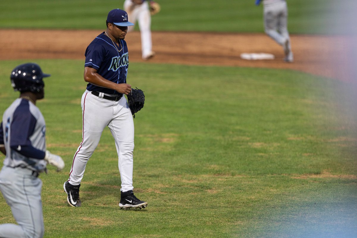 Bryan Caceres jogs back to the dugout. Caceres was effective against the Cyclones on Saturday, Aug. 17, tossing six scoreless innings. - Photo via @WilmBlueRocks on X