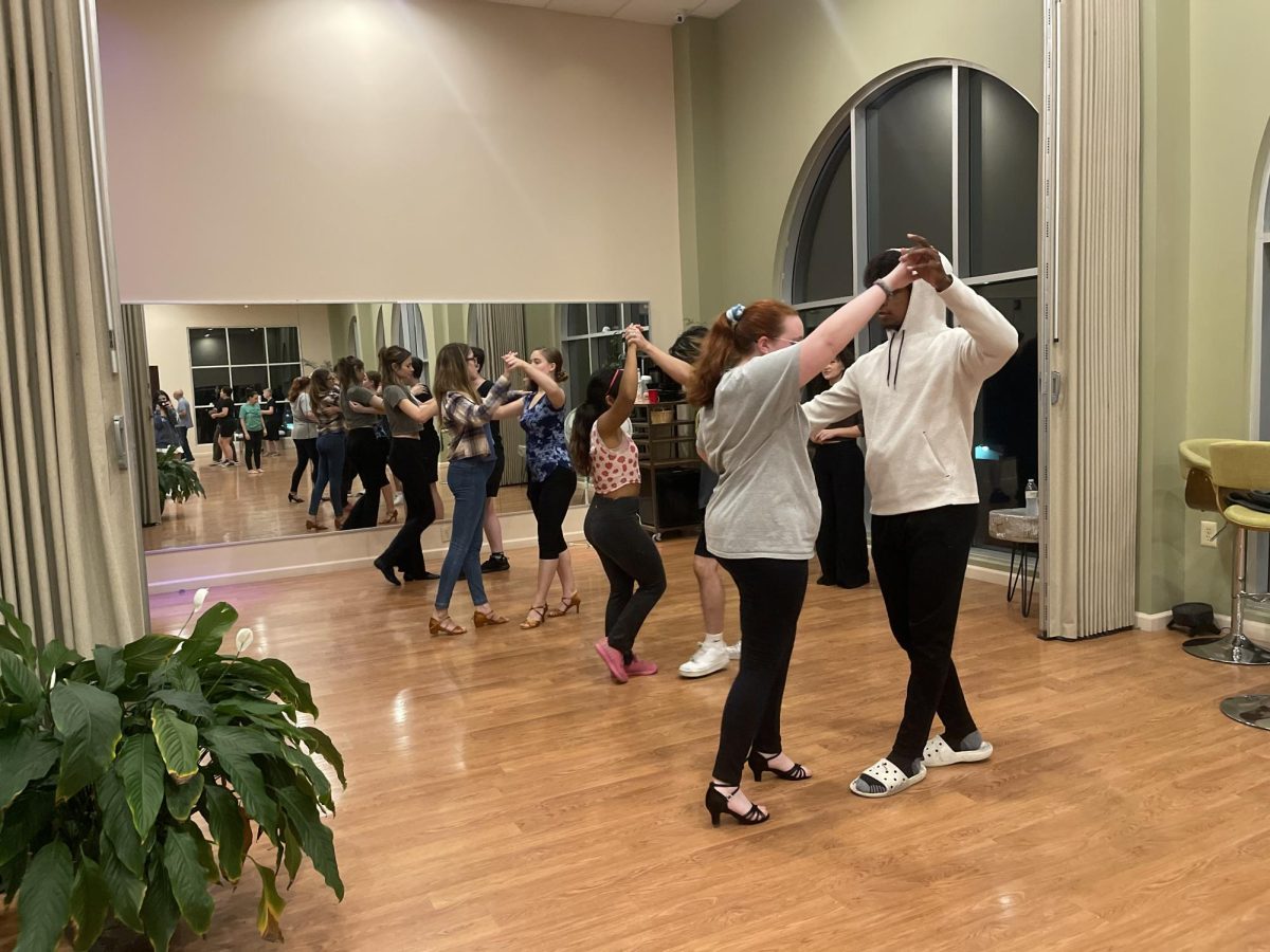 Rowan Ballroom Club practicing dance combinations taught by instructor Krystal Bradley. - Copy Editor / Marchella Mazzoni