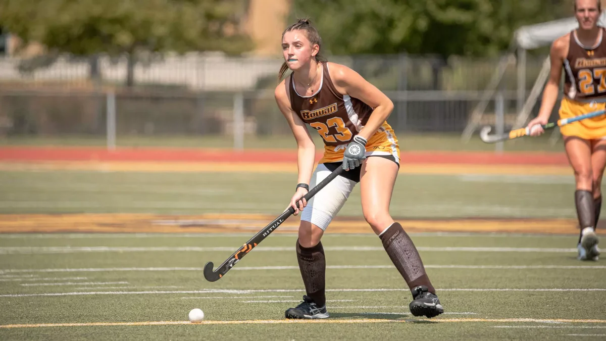 Tess Herman scans the field. Herman scored the first goal of the game against Catholic. - Photo via Rowan Athletics