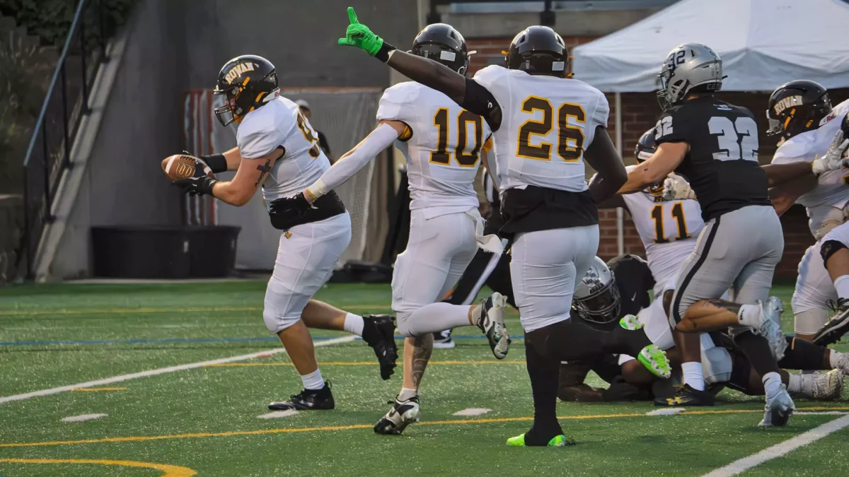 Carter Williams intercepts the ball and takes it to the house against Stevenson. - Photo via Rowan Athletics