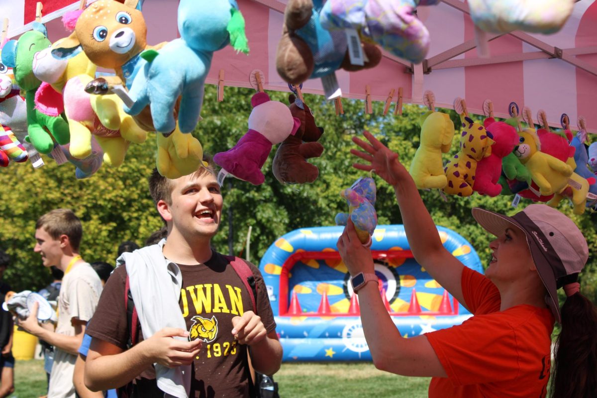 Rowan student earns a prize at one of the game venues at Rohrer Festival at Business Hall. - Contributor / Grady Stefankiewicz