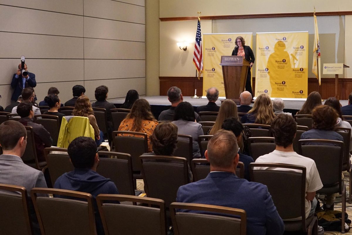 Amanda Haines, executive director of ELEC, addresses the crowd on campaign finance at RIPPAC event. - Photography Editor / Gavin Schweiger