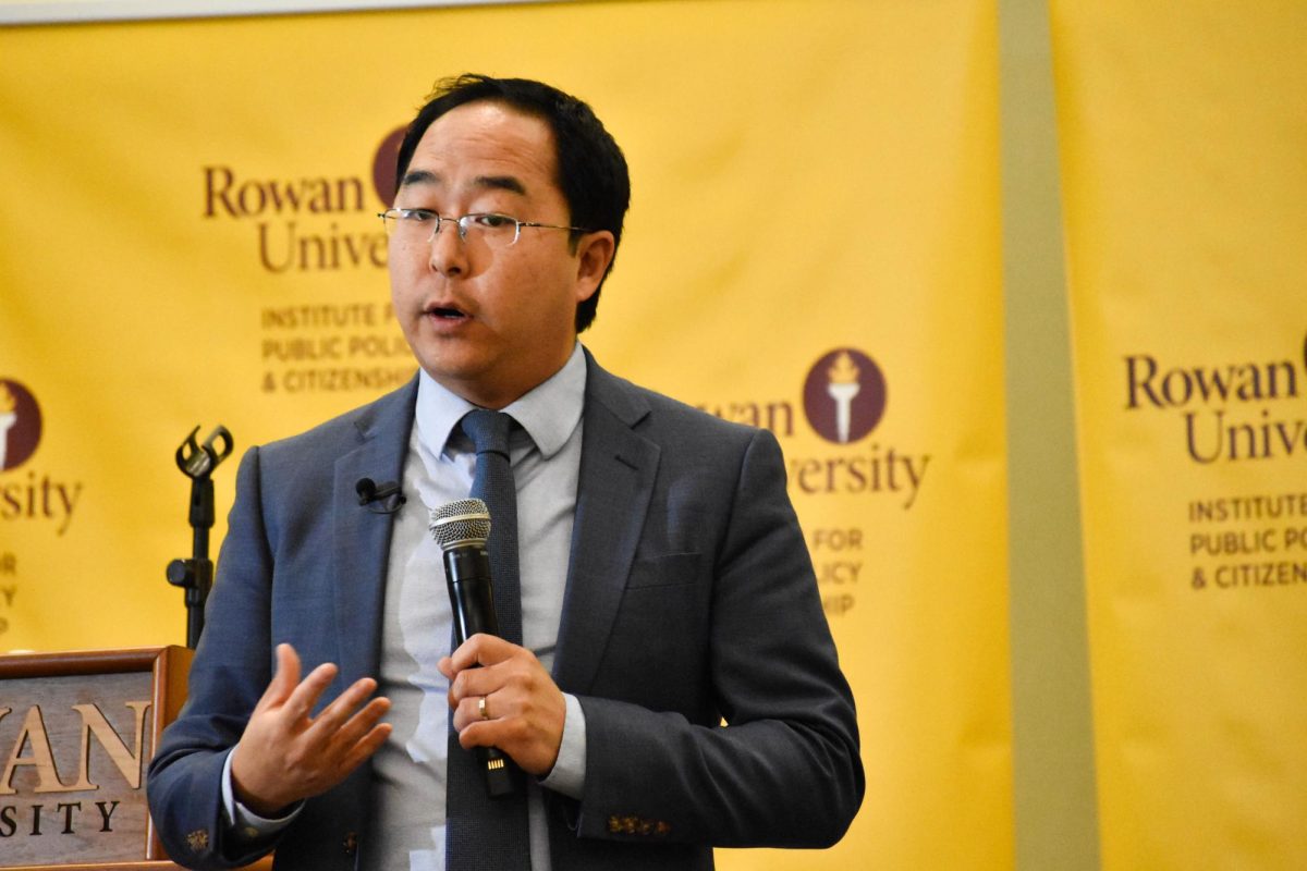 Congressman Andy Kim addresses the crowd in the Eynon Ballroom. - Staff Photographer / Owen Miller