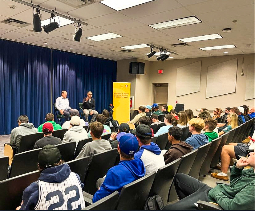 Jon Crispin talking to students at Pizza with the Pros. - Staff Writer / Curtis Ulrich