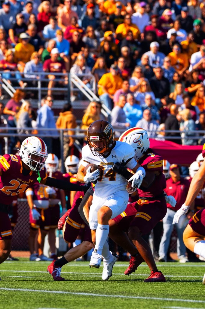 Luke Hoke gets tackled following a big gain. The freshman recorded a game-high 131 receiving yards against Salisbury. - Photo / Kevin Alexander