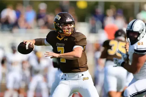 Nate Maiers looks towards the reciever. Maiers threw for 166 yards in the loss. - Photo via Rowan Athletics