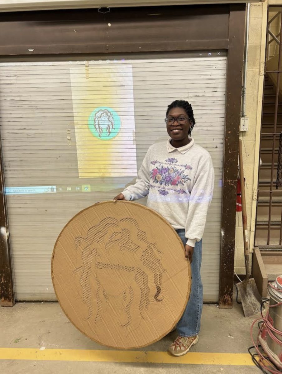 Jadah Kingston alongside her sculpture. - Photo via Jadah Kingston