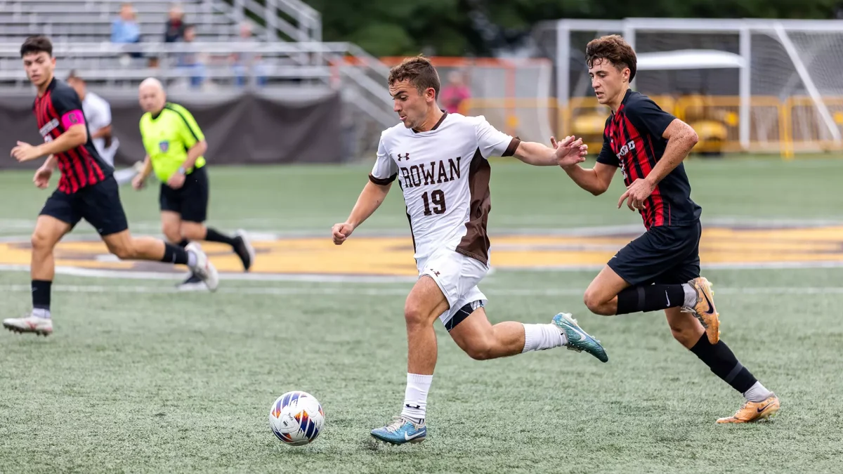 Johnny Troiano attacks the defense. Troiano recorded eight shots in the loss to Washington College. - Photo via Rowan Athletics