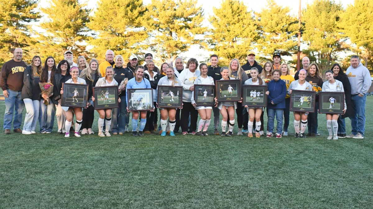 The seniors celebrate with their families pregame. - Photo via Rowan Athletics